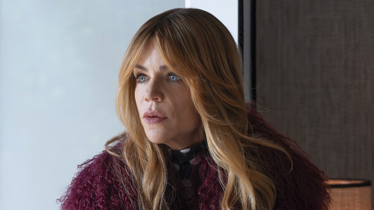 Morgan in magenta furry coat staring worriedly in High Potential Season 2 "NPC"