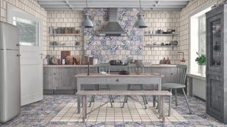 kitchen diner with patterned blue and white floor and wall tiles