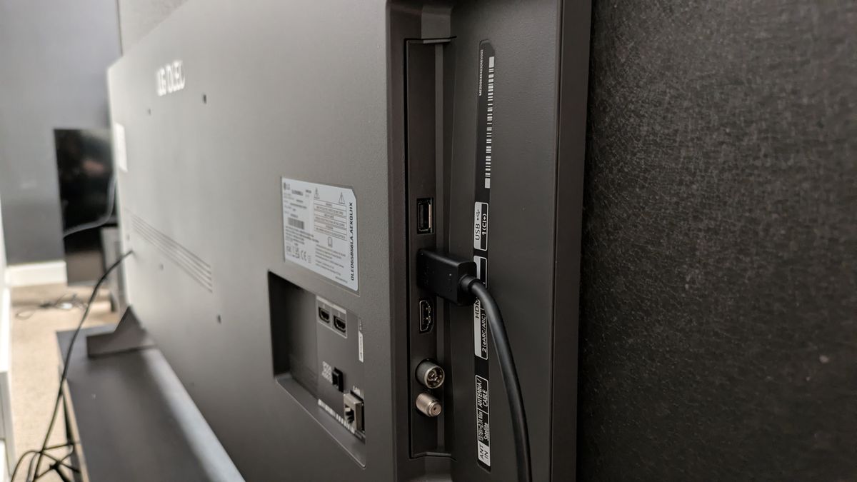 LG B6 OLED TV ports, showing a HDMI cable in HDMI port 1