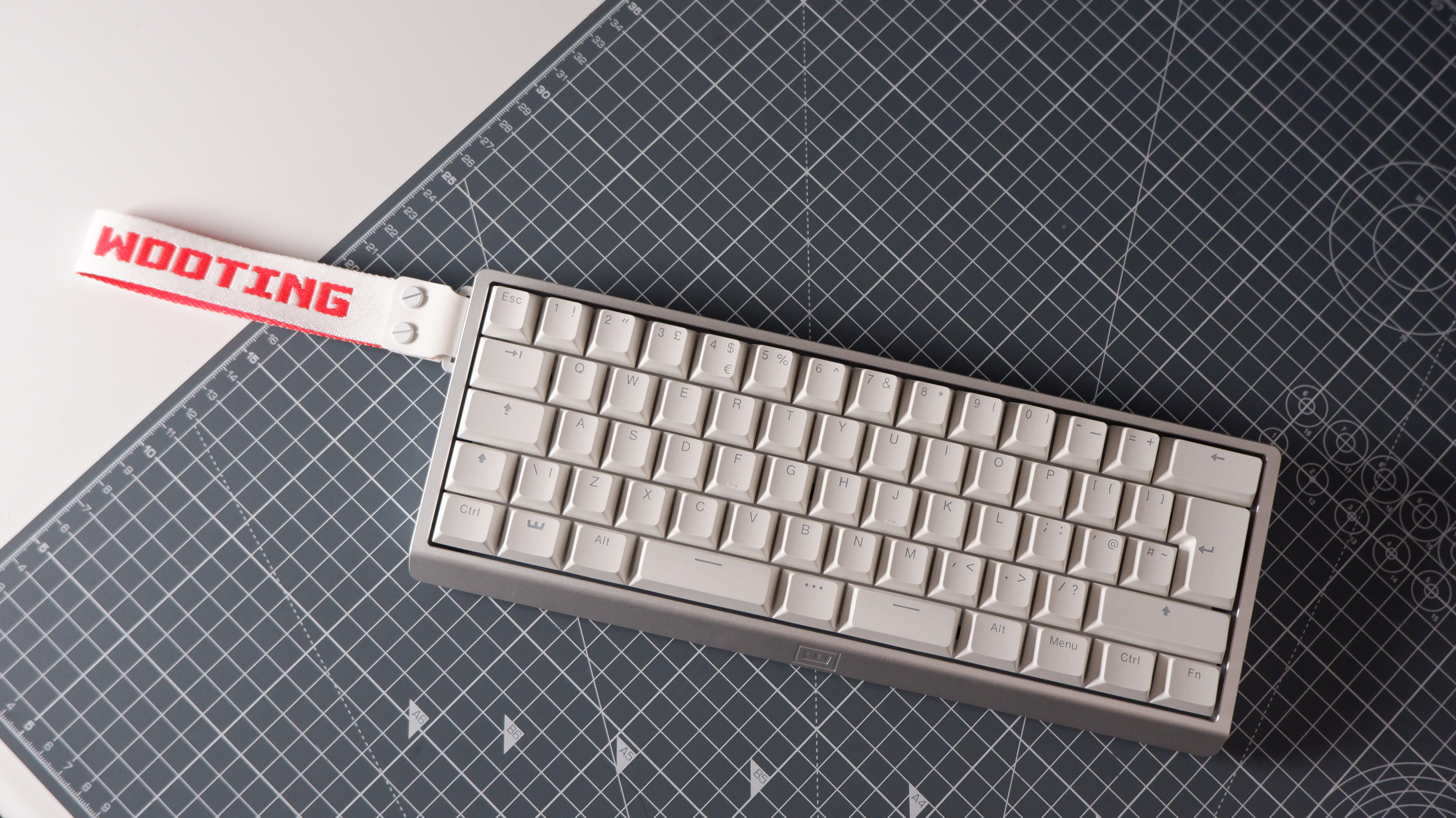 The Wooting 60HE v2 at various stages of being built.