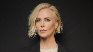 charlize theron on the red carpet with a bob hairstyle