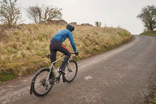 Image shows rider on a winter bike with mudguards.