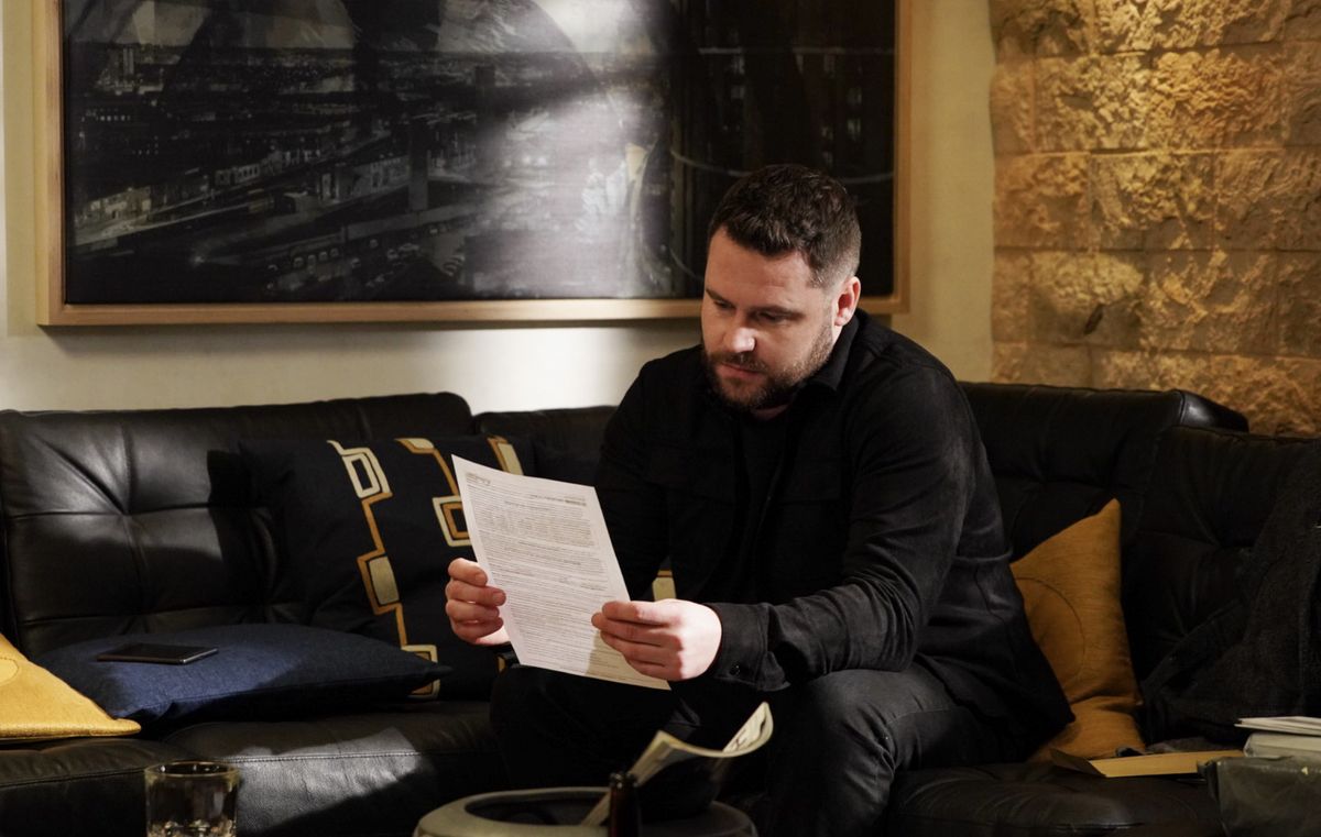 Aaron Dingle in Emmerdale reading a letter