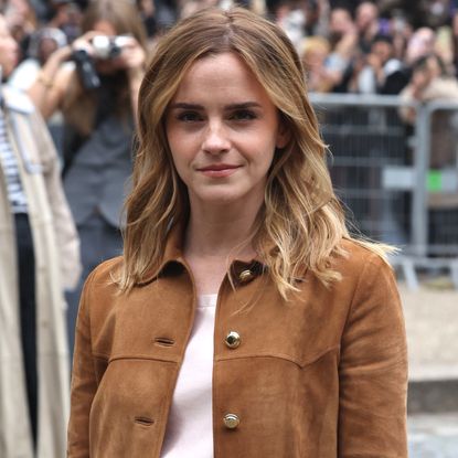 Emma Watson arrived at the Miu Miu Spring 2026 show during Paris Fashion Week wearing the fall suede jacket trend