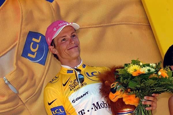 Stage winner Gerdemann with flowers and lion.