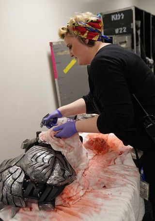 Cleaning blood off Gene Simmons' costume