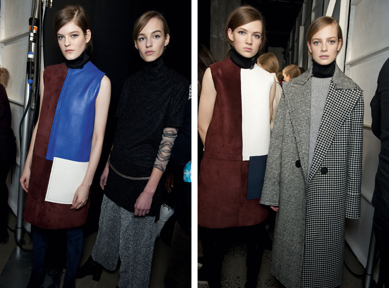 Models wearing high necked fashion clothing