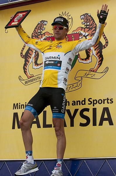 Tour leader David Zabriskie (Garmin Barracuda) from the USA shows his dance style on the podium in Melaka.