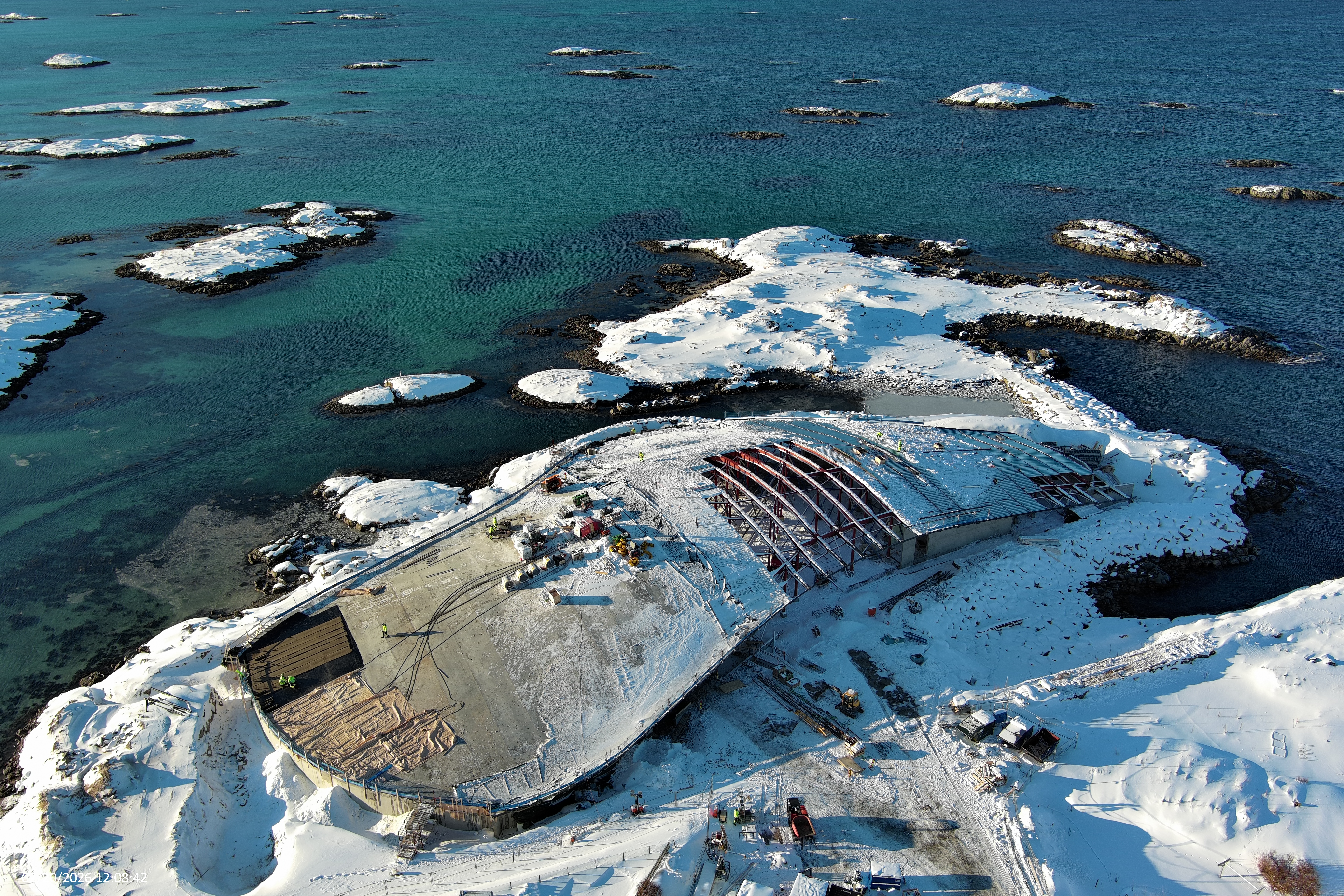 photo of the building site of The Whale by Dorte Mandrup in the Norwegian coast line among snow