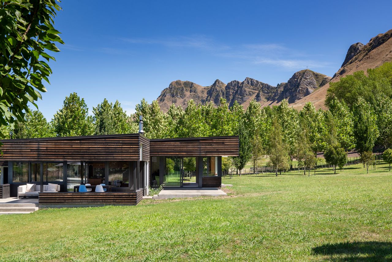 a modern house with expansive lawn