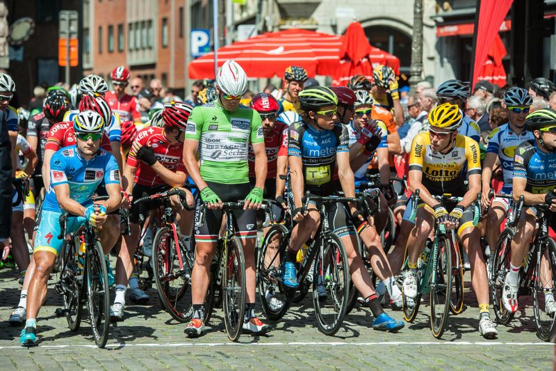 The riders wait on the start line for the stage to get underway