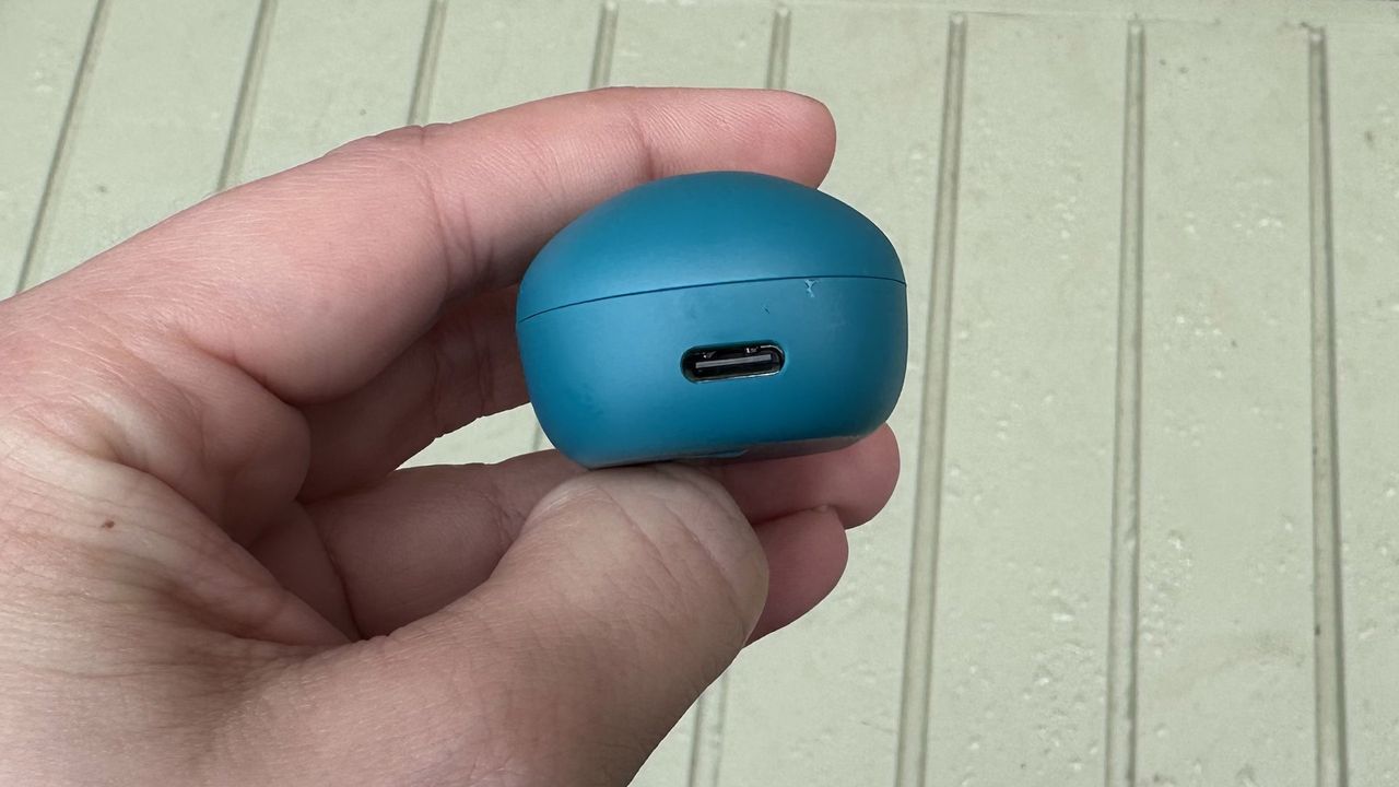 A close up of the charging port on the JLab JBuds Mini