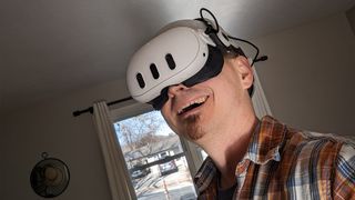 Smiling while wearing a Meta Quest 3 headset with a BoboVR M3 Pro head strap