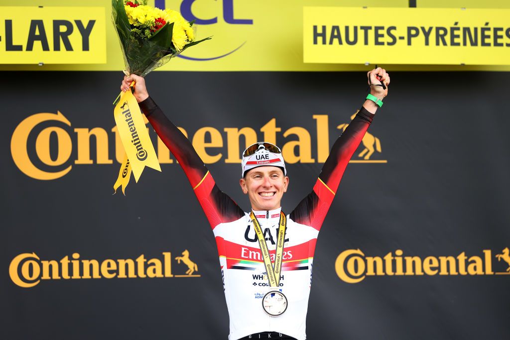 SAINTLARYSOULAN COL DU PORTET FRANCE JULY 14 Tadej Pogaar of Slovenia and UAETeam Emirates celebrates at podium during the 108th Tour de France 2021 Stage 17 a 1784km stage from Muret to SaintLarySoulan Col du Portet 2215m LeTour TDF2021 on July 14 2021 in SaintLarySoulan Col du Portet France Photo by Michael SteeleGetty Images