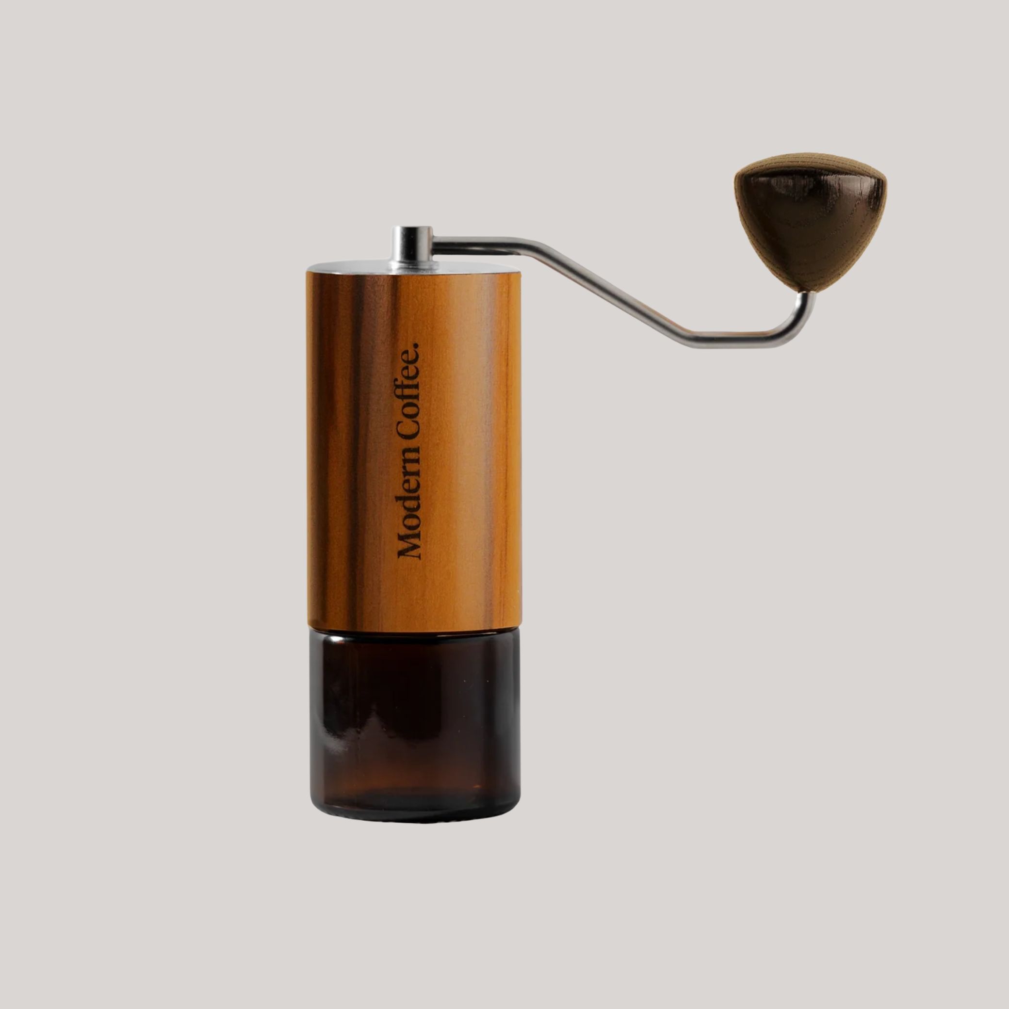 WatchHouse Comandante C40 Mk4 Grinder against pale gray background.