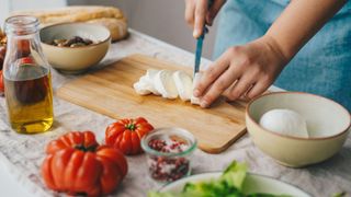 woman preparing a healthy salad