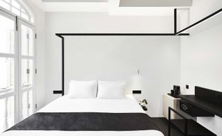 A large bed inside a room in the Hotel Mono — Singapore