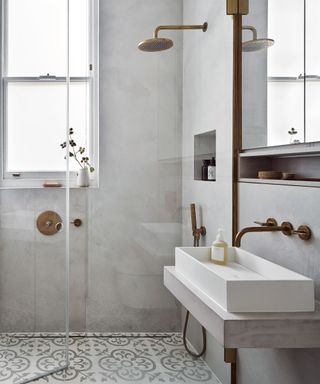 bathroom with grey walls and white sink