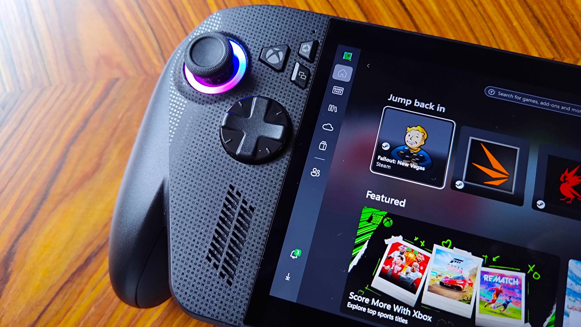 Close up of ROG Xbox Ally X right hand side with Full Screen Experience enabled and Fallout New Vegas icon highlighted in "Jump Back In" menu.