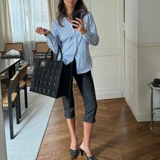 Influencer wears capri pants.