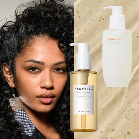 a model with glowing skin and dark hair next to two bottles of cleaning oil