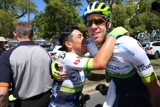 The 1.65m Caleb Ewan tries to give 1.90m Mat Hayman a hug after his stage win