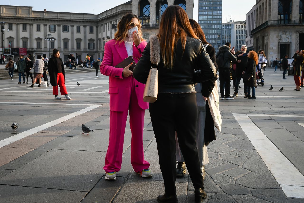 Man and woman stroll through the city with protective masks and sanitizing gels to counteract the possible infection of the &amp;#039;&amp;#039;CoronaVirus&amp;#039;&amp;#039;,Milan,Italy, February 23,2020 (Photo by Andrea Diod