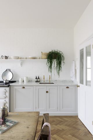 Rustic white kitchen with open shelving