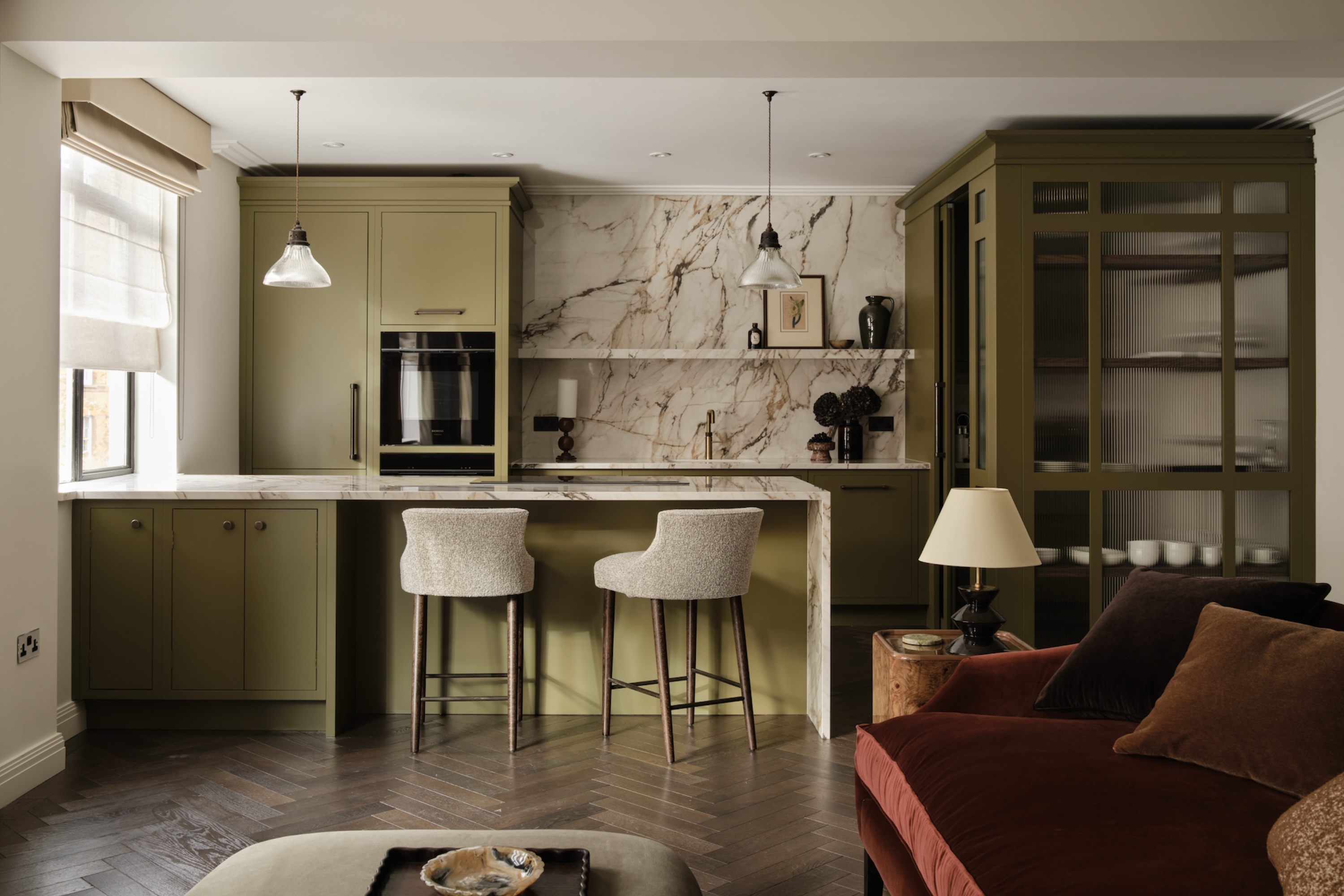 olive green kitchen with marble countertops by Imperfect Interiors
