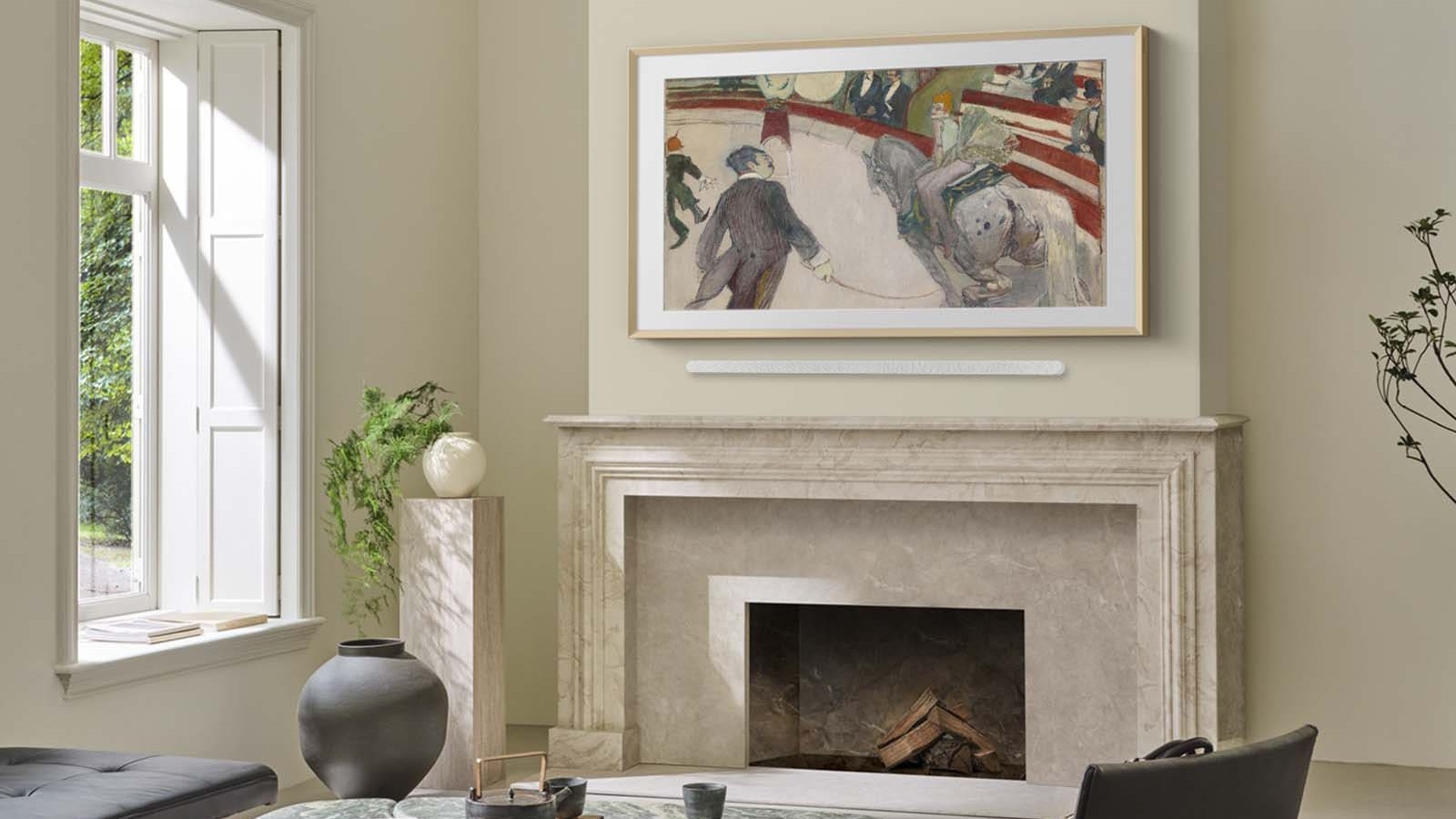 Samsung Vision AI on a wall above a fireplace in a beige room