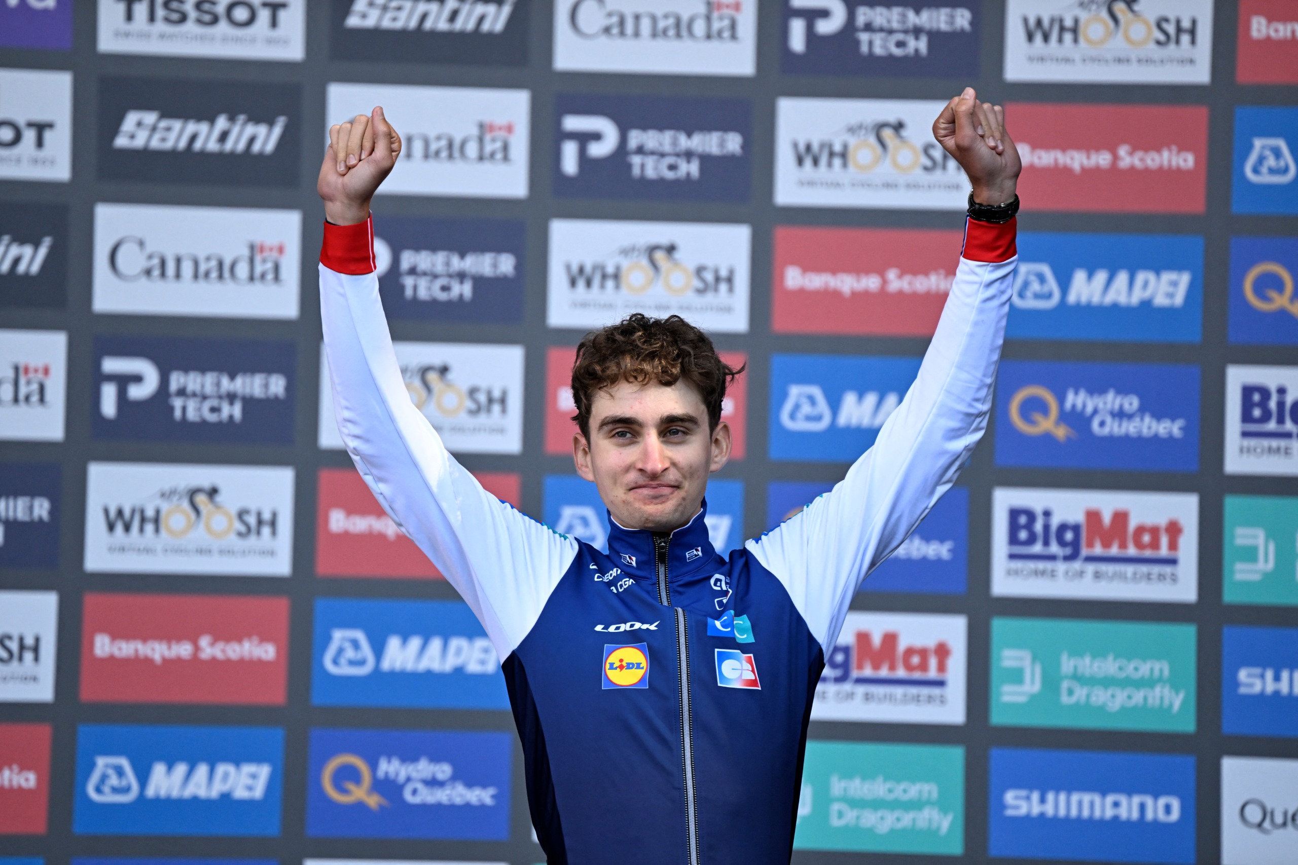Paul Seixas celebrates on the podium at the UCI Road World Championships 2026