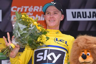 Chris Froome in yellow on the stage 5 podium at Criterium du Dauphine