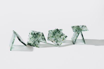 ‘Forite’ tiles made of clear and green recycled glass styled against a light grey background
