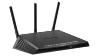Netgear Nighthawk XR300 wireless router finished in black colorway and shown on white background