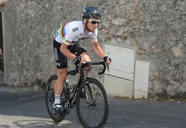 Team Sky's Mark Cavendish cuts a lone figure back down the road in stage 13
