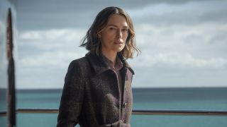 Keira Knightley in a peacoat on a yacht in The Woman In Cabin 10