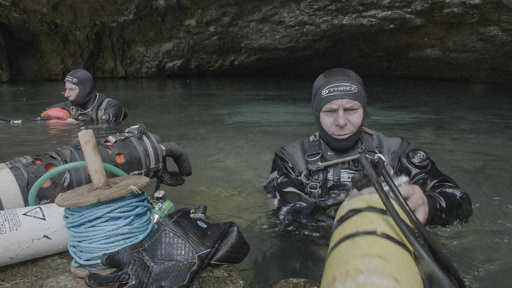TV tonight divers head out to rescue the junior football team in Thailand.