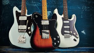 Three Fender guitars next to each other