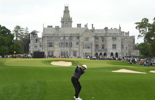Tiger Woods hits an approach on the 9th hole at Adare Manor