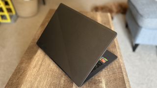 Asus ROG Zephyrus G14 gaming laptop with lid open showing back