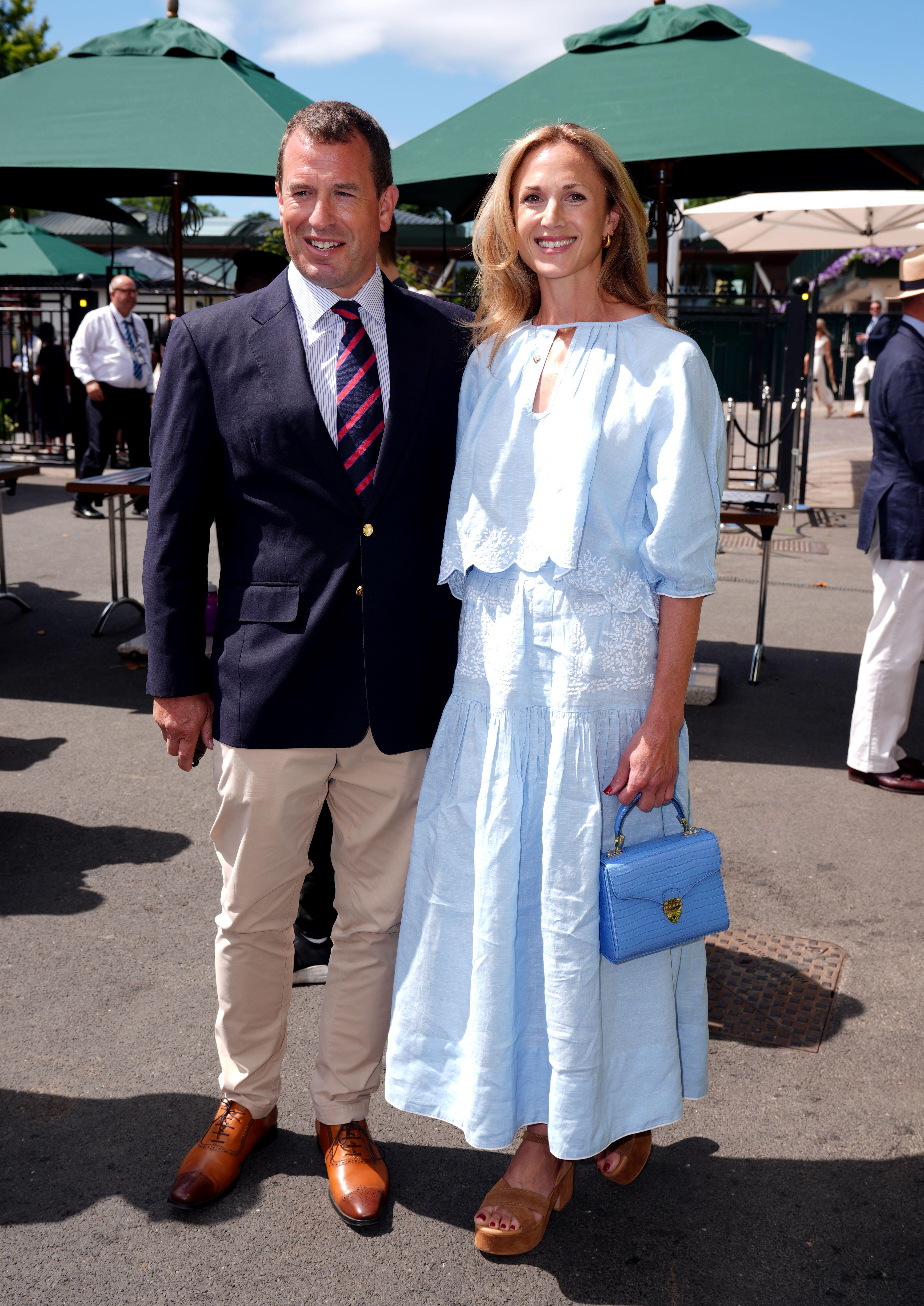 Peter Phillips in a blue suit and Harriet Sperling in a blue skirt and top at Wimbledon 2025