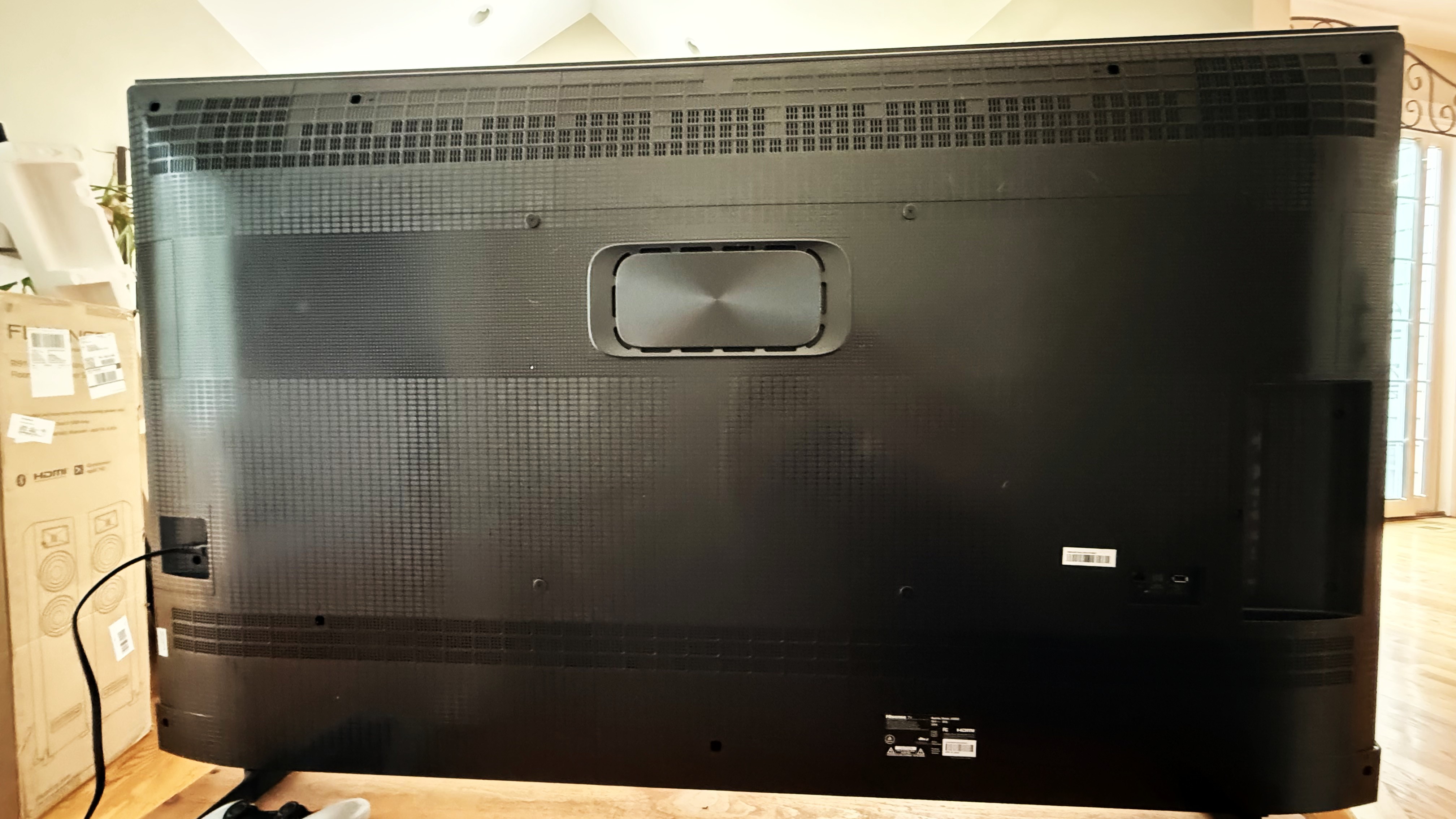 Hisense U65QF rear panel showing subwoofer