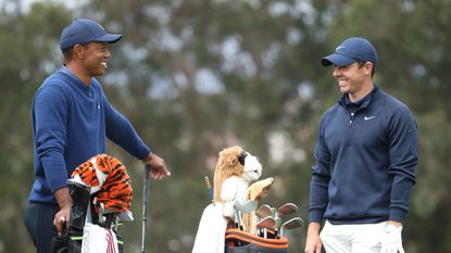 Tiger Woods and Rory McIlroy share a joke