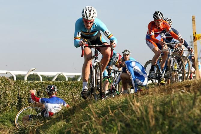An off-camber section claims a couple of riders.
