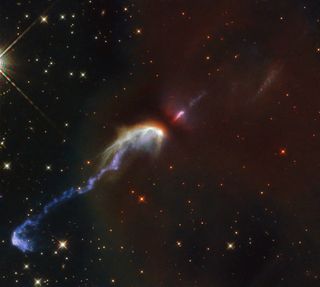 In this image, snapped by the Hubble Space Telescope, you can see two Herbig-Haro objects, which are created when thin, stringy jets of ionized gas shooting out of stars collides with nearby clouds of gas and dust. The Herbig-Haro objects here, HH46 and HH47, were spotted in the constellation Vela (the sails), a whopping 1,400 light-years from Earth.