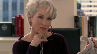 Meryl Streep sits in her desk during an interview in The Devil Wears Prada