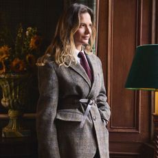 a model wearing a tweed blazer from the lands' end harris tweed collaboration
