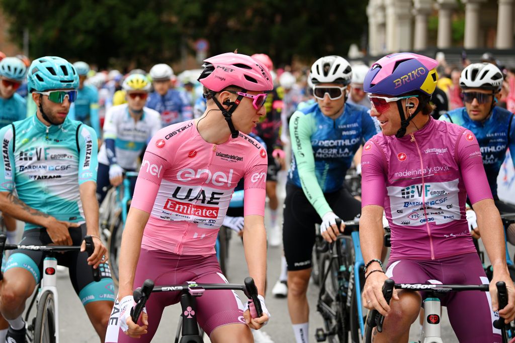 NOVARA ITALY MAY 06 LR Tadej Pogacar of Slovenia and UAE Team Emirates Pink Leader Jersey and Filippo Fiorelli of Italy and Team VF Group Bardiani CSF Faizane Purple Points Jersey prior to the 107th Giro dItalia 2024 Stage 3 a 166km stage from Novara to Fossano 374m UCIWT on May 06 2024 in Novara Italy Photo by Dario BelingheriGetty Images