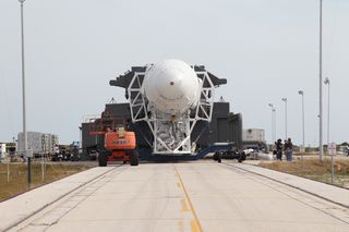 Falcon 9 Rocket and Dragon Spacecraft Rolling to Launch Pad, April 2012