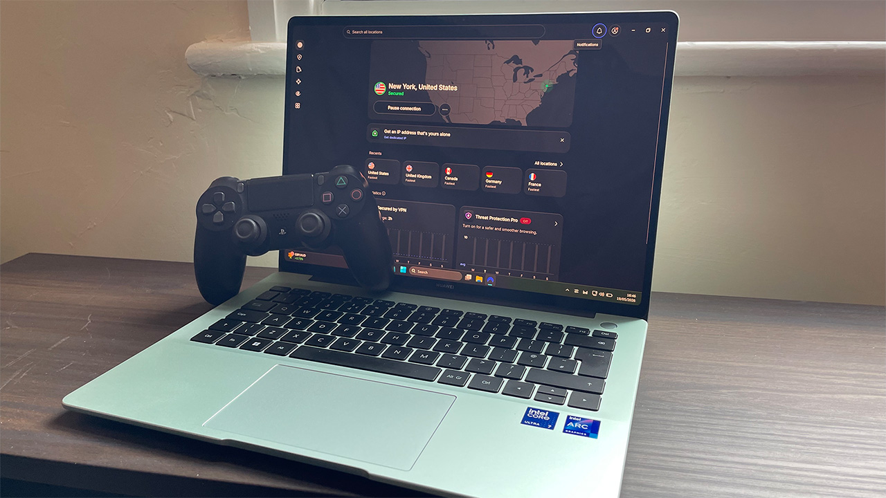 NordVPN connected on Windows laptop, with PS4 controller resting on the keyboard 